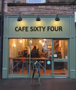 Photo of green shopfront with text "CAFE SIXTY FOUR"