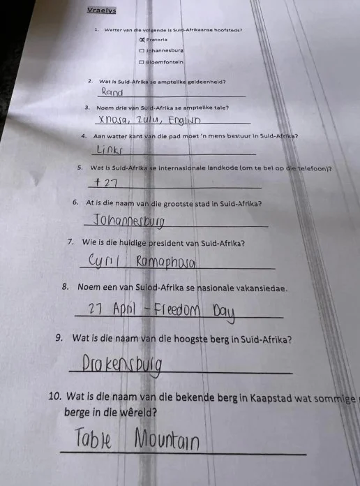 An Image of the Questionnaire discussed in the article. It shows ten questions all asked in Afrikaans regarding general trivia about South Africa such as the name of the current president.