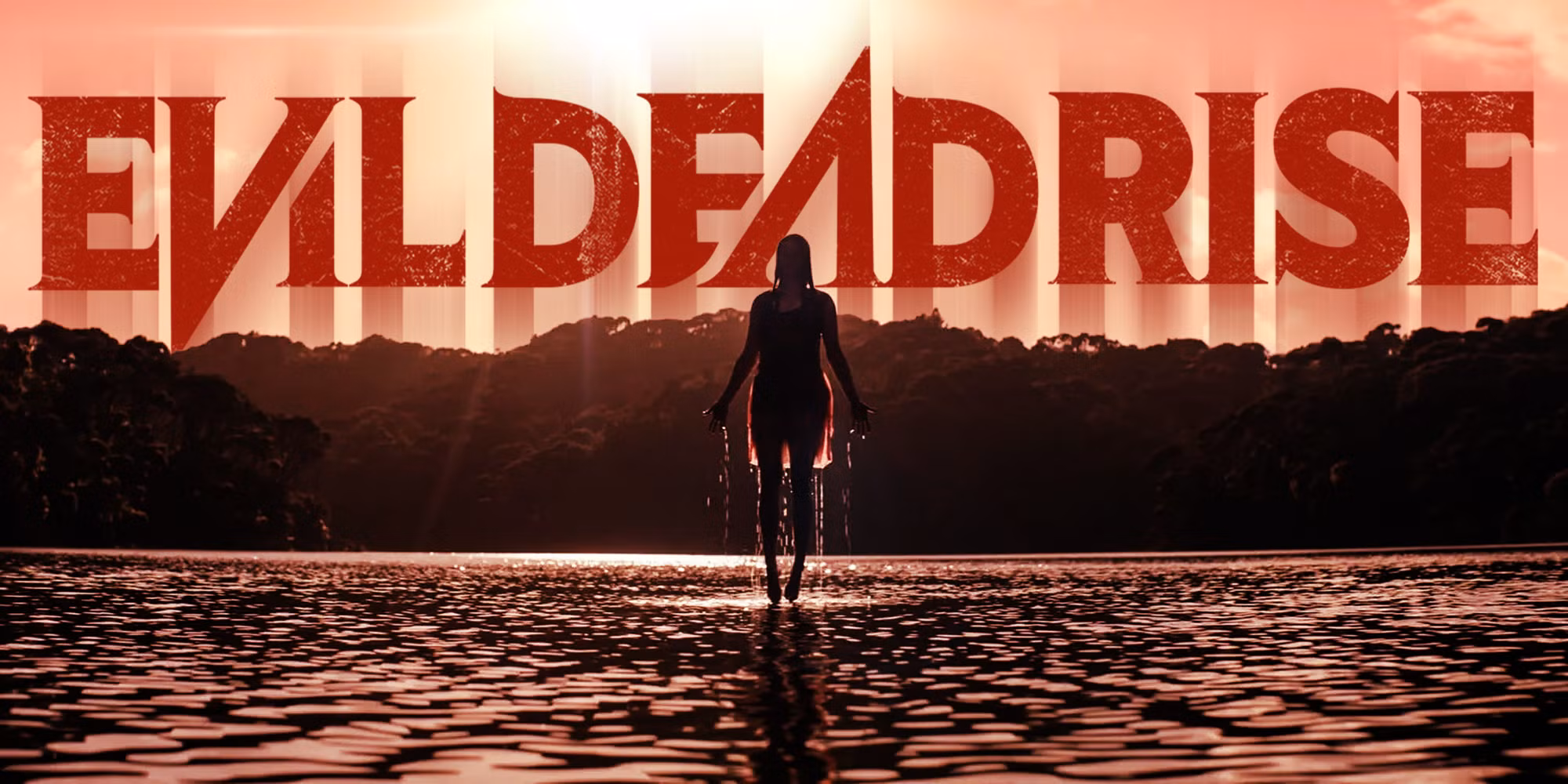 Women levitating above lake with bold red letters spelling out evil dead rise sit above tree line